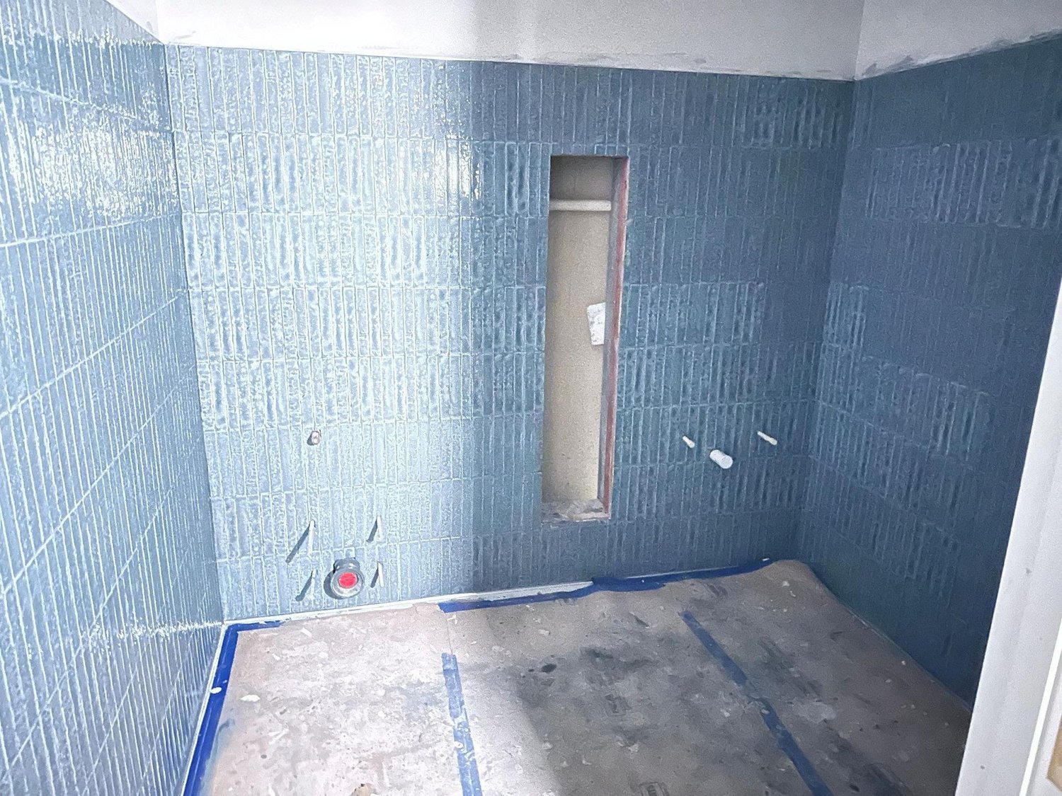 Waterside restroom walls prepared for tile